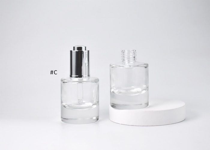 luxury glass cosmetic bottles with press button dropper