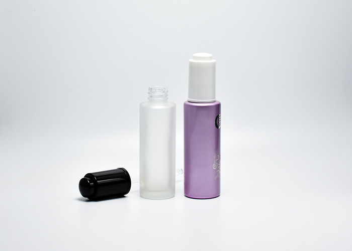 glass bottle with push button dropper pipette for beauty oils