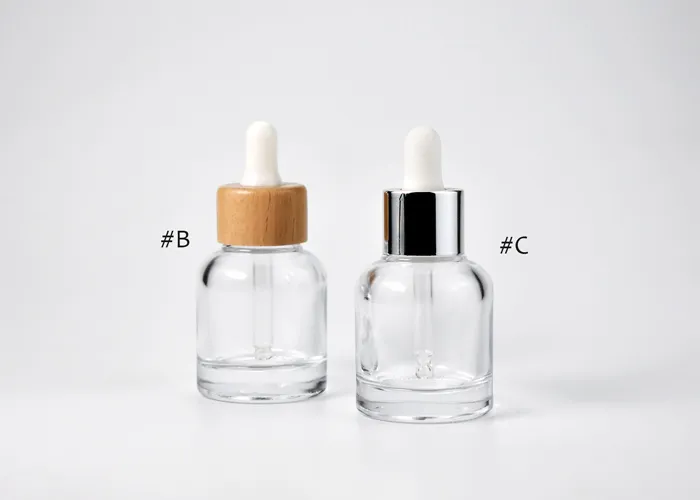 wooden cosmetic dropper pipette and glass bottle packaging