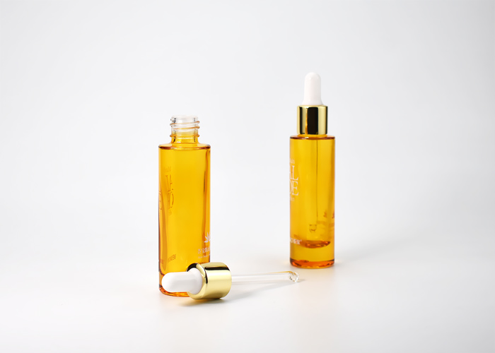 stylish orange flint glass cosmetic dropper bottle with pipette