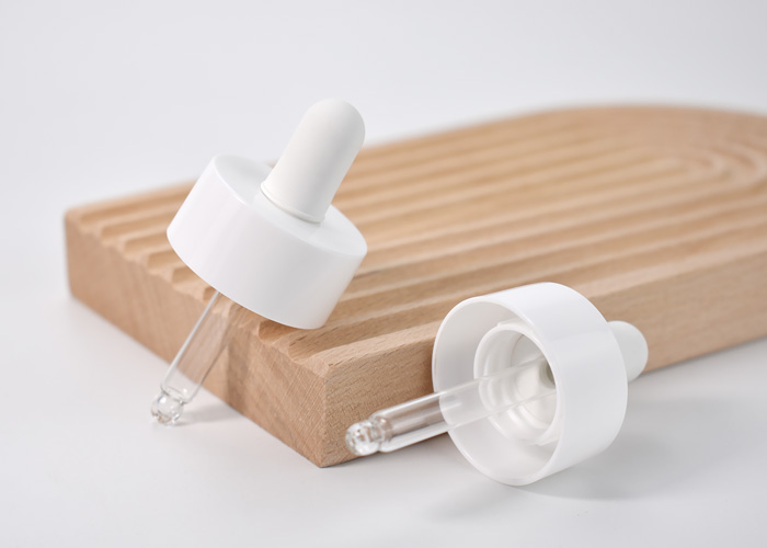 Wide double-wall cosmetic dropper cap designed for dispensing beauty oils in skincare, haircare, and body care. High-quality materials with customizable options