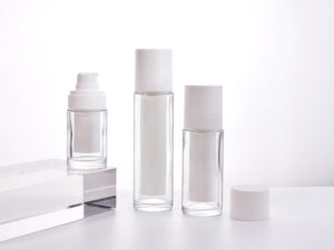 Premium airless refillable glass bottle with pump, available in 15ml, 30ml, and 50ml sizes for skincare packaging