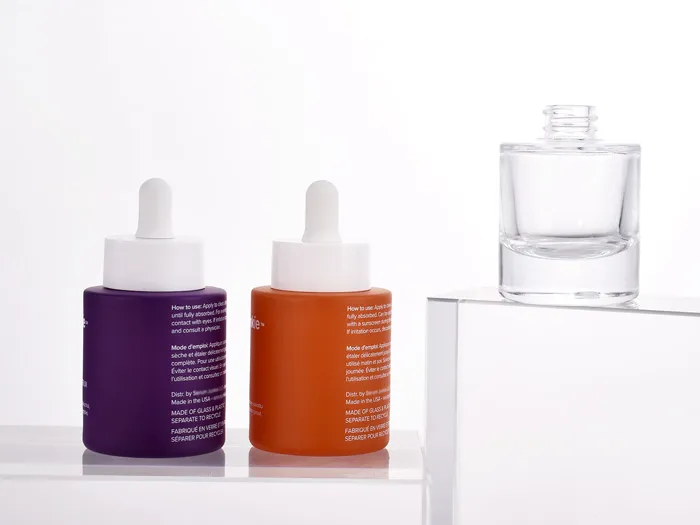 30ml cylinder thick-base glass bottle with dropper pipette as packaging for serum and beauty oils