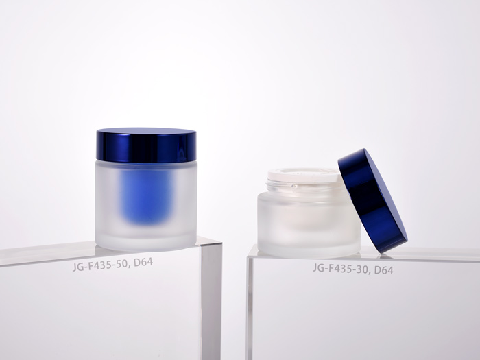 cylinder round glass cosmetic jar, features double wall with refill, with lid sitting flush on the side, as skincare packaging for wholesale and custom design