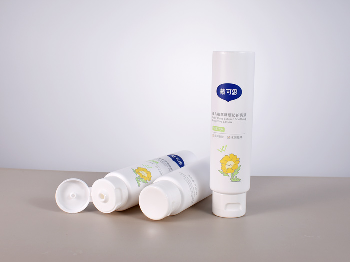 White cosmetic squeeze tubes for lotions and creams with flip-top caps for wholesale and custom order