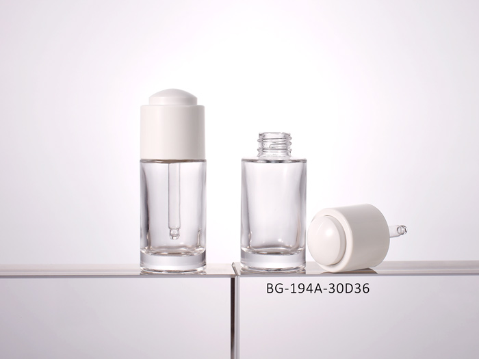 Luxury glass dropper bottles 30ml thick wall clear serum packaging glass dropper bottles wholesale