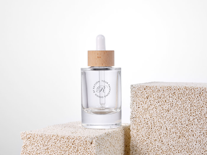 Extra thick-bottom glass cosmetic bottle wholesale with natural wood-look dropper for skincare serum and hair oil