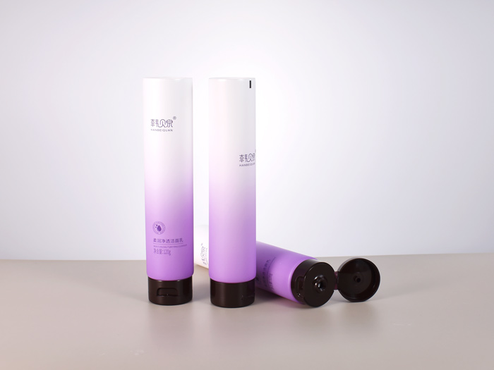 A custom plastic flip top tube for cosmetics, presented by Rayuen, a leading cosmetic tube packaging supplier.